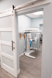 Orthodontic treatment room at BZ Orthodontics featuring advanced imaging equipment, emphasizing Invisalign options and braces in Lansdale, PA.