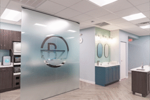 BZ Orthodontics office interior featuring logo, modern design, and dental treatment area, emphasizing Invisalign and braces services in Lansdale, PA.